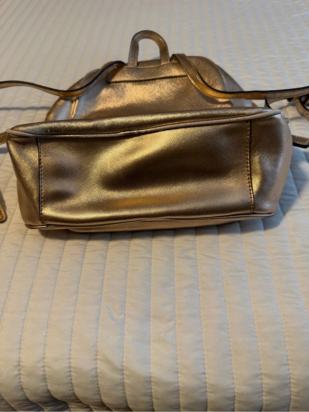 GUESS Metallic Gold Logo Backpack with Flower Charm